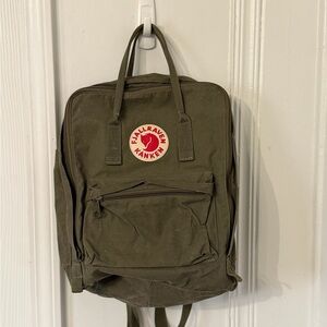 Fjallraven Kånken Backpack in Olive Green with Red Logo